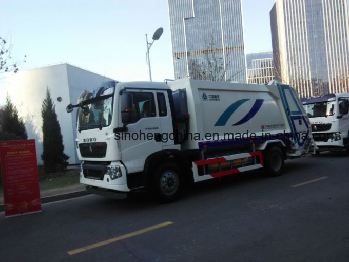 HOWO 4X2 Garbage Truck 16m3 Compressor Garbage Truck Images 1