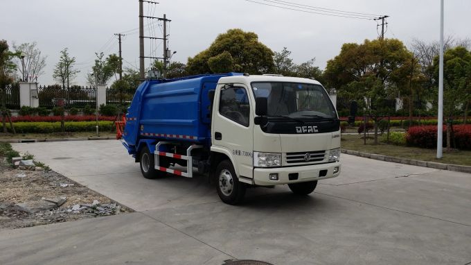 Dongfeng 6.5m3 Garbage Truck, Rear Loader, 3t Payload, Low Price Images 1